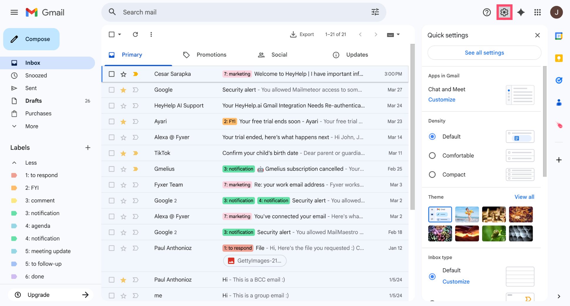 Gmail inbox with the settings gear icon highlighted